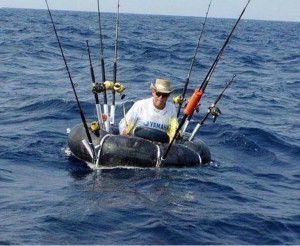 jet ski, guy fishing in inner tube, offshore PWC fishing, jet ski fishing