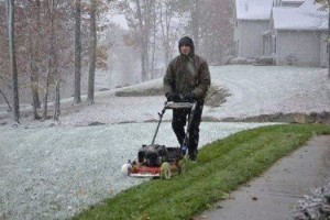 mowing snow, lawnmower in snow,spring snow, delaware, sussexcounty