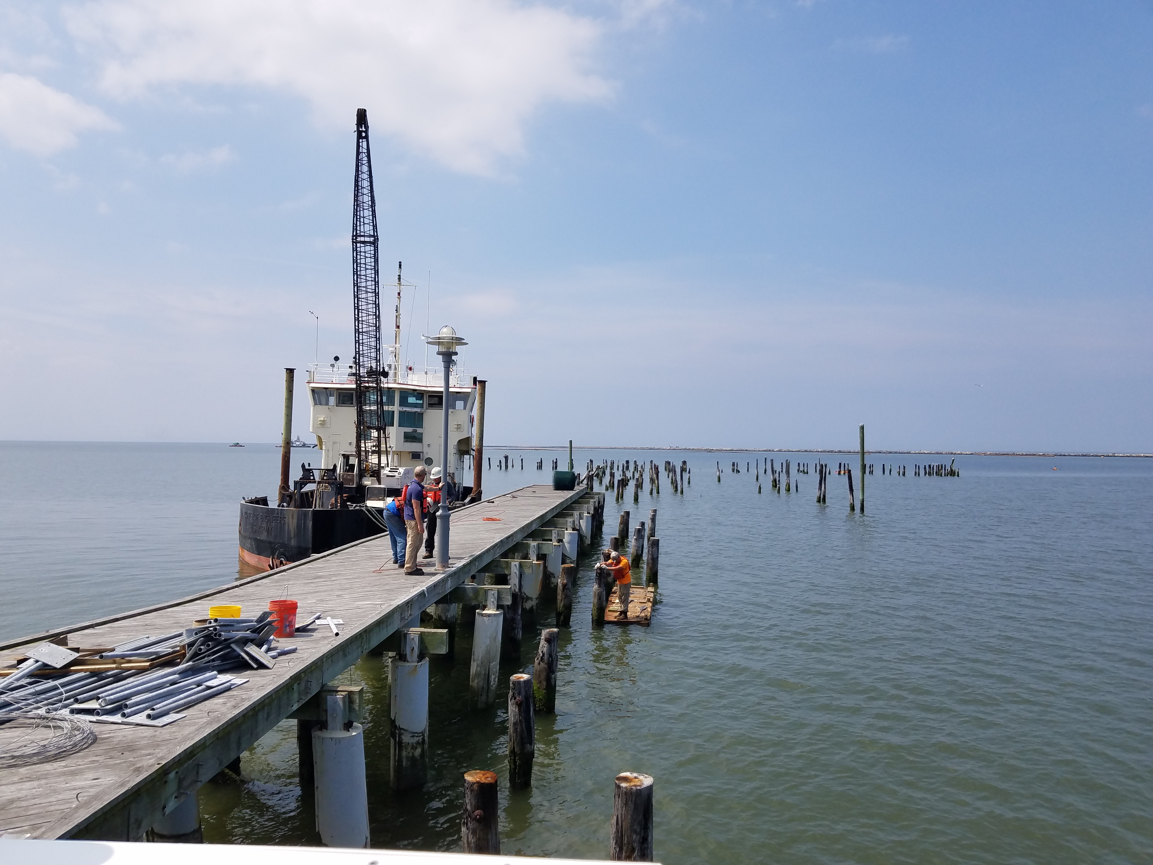 Crews are dismantling the end of the cape henlopen fishing pier