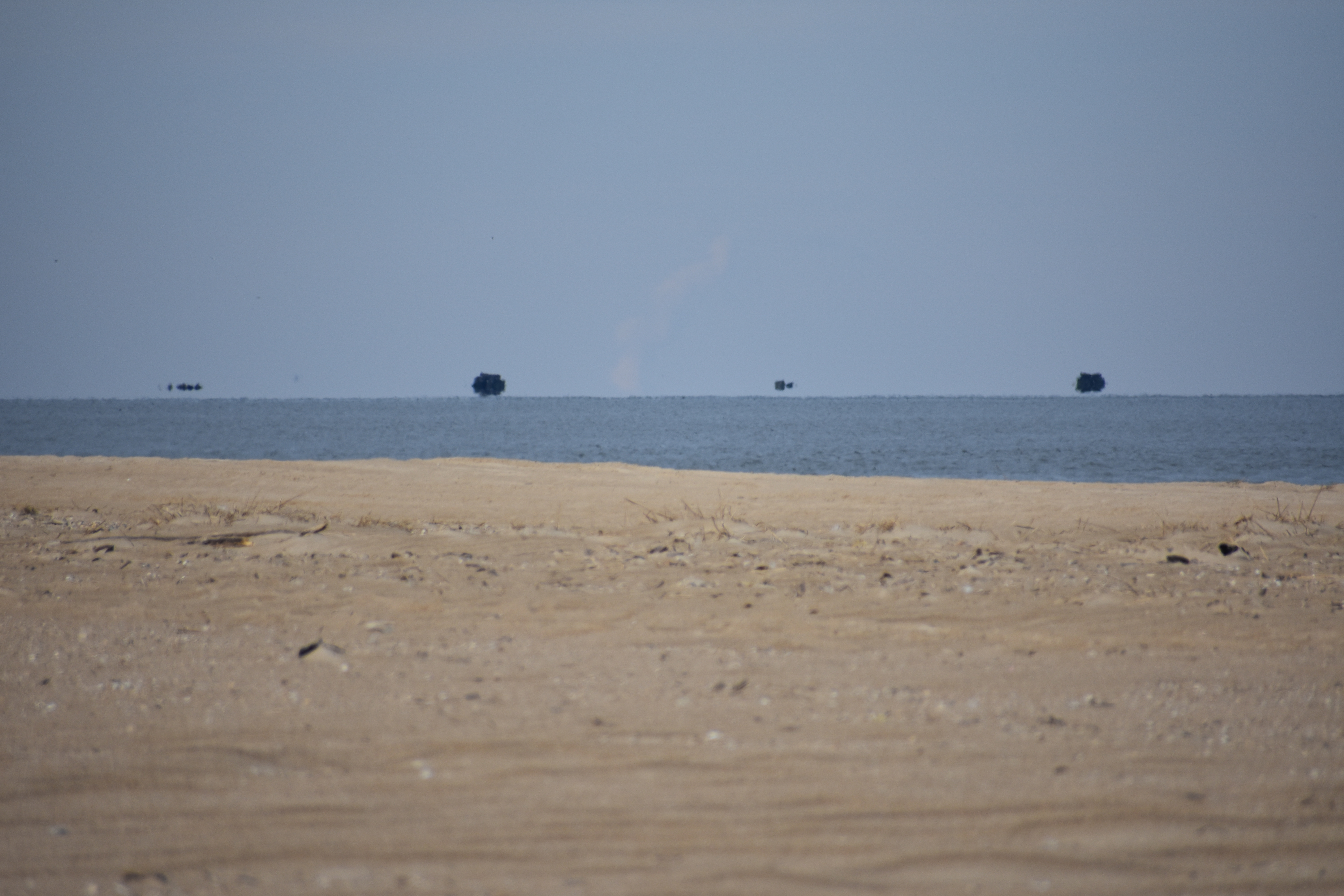 fata morgana, mirages on the water, floating ships, delaware, cape henlopen state park, the point, the haystacks