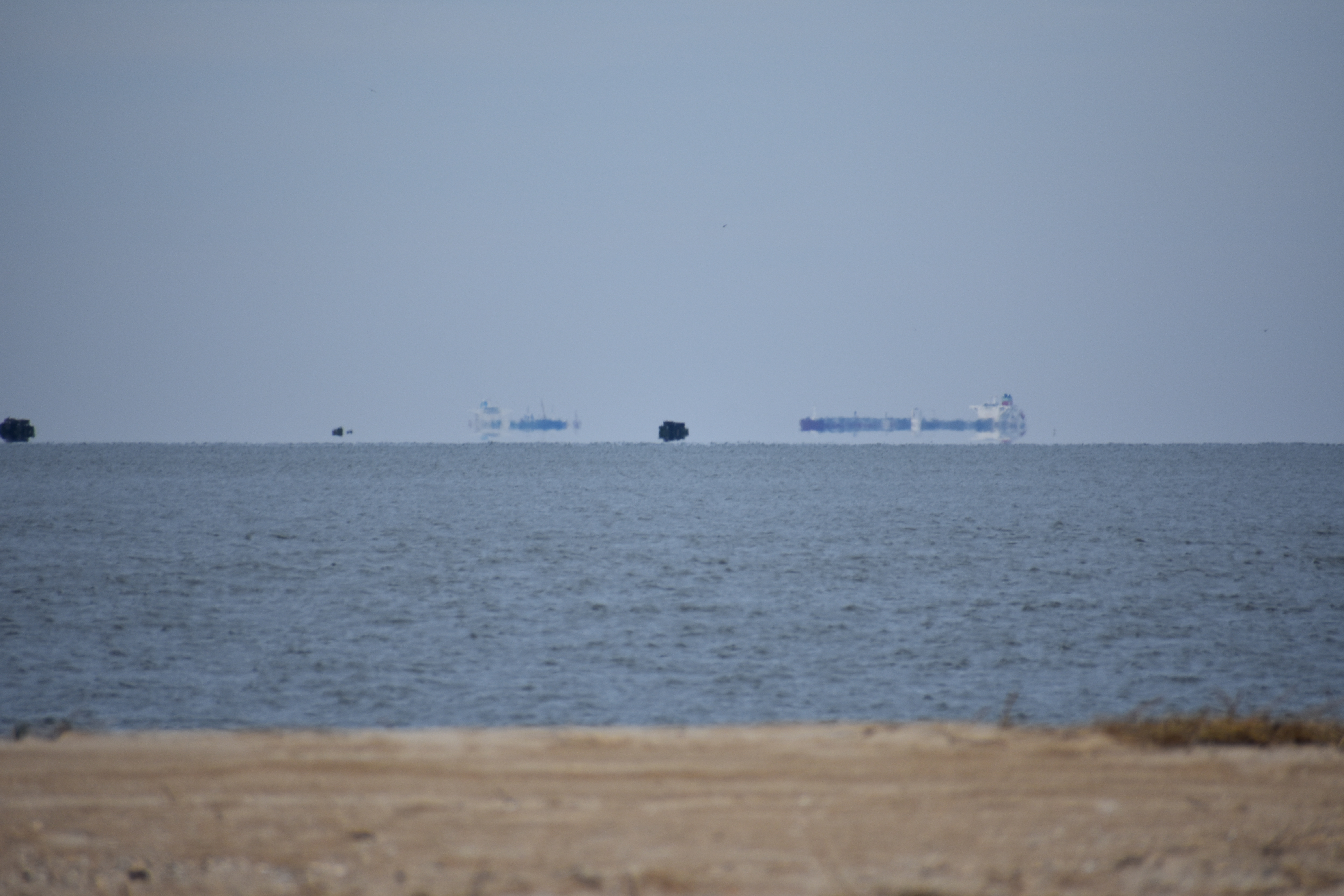fata morgana, mirages on the water, floating ships, delaware, cape henlopen state park, the point, the haystacks, ghost ships, mirage,