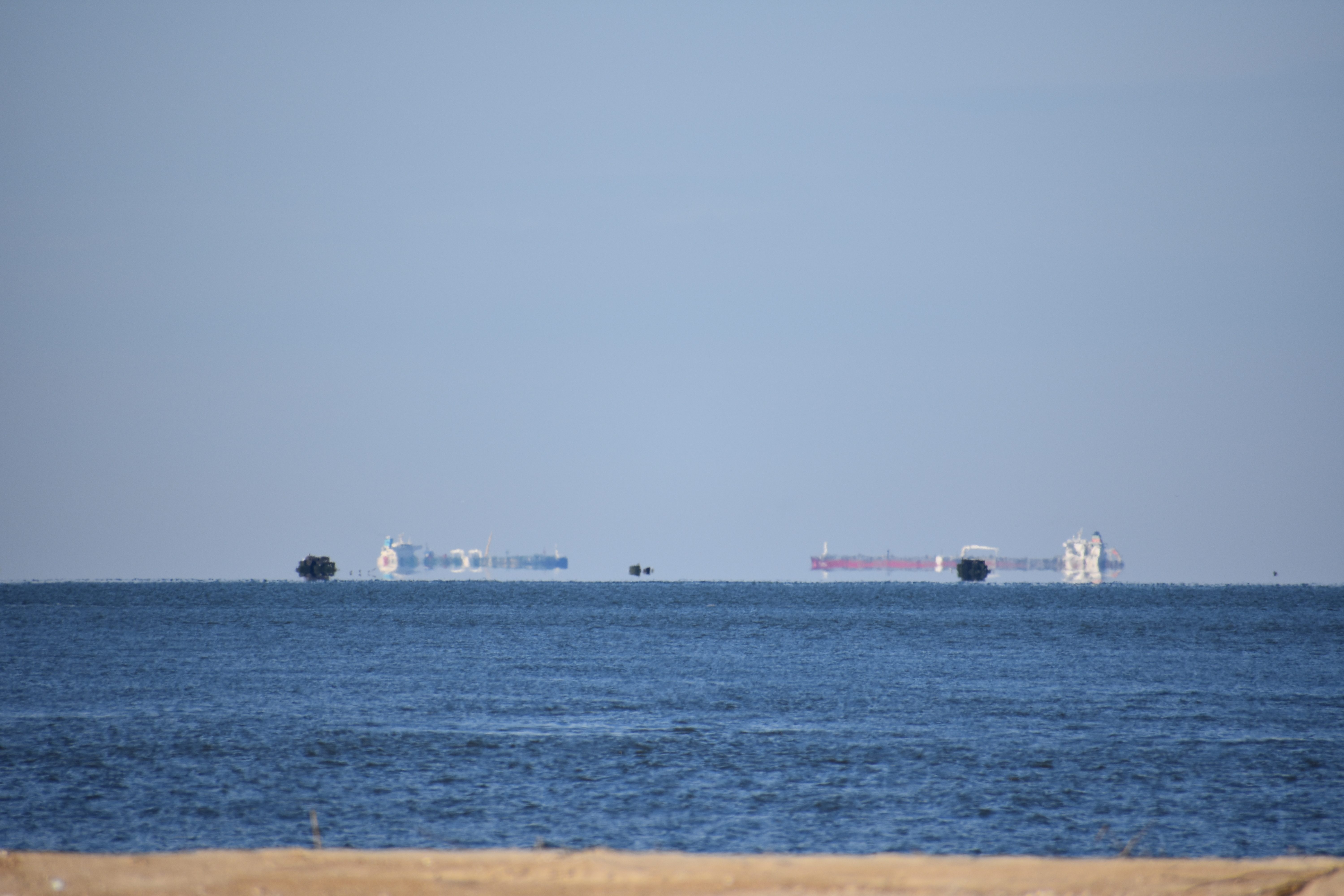 fata morgana, mirages on the water, floating ships, delaware, cape henlopen state park, the point, the haystacks