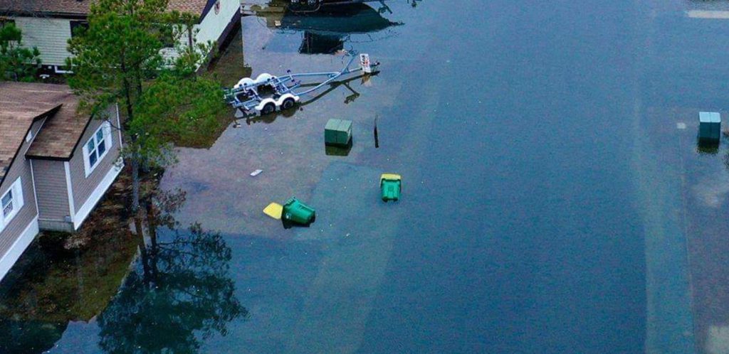 coastal flooding, pollution, flood zone, recycling containers, inland bays, mariners cove