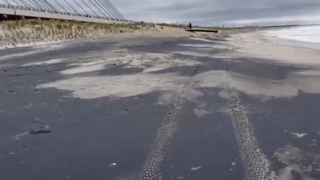 black sand, delaware beaches, delaware surf fishing, indian river inlet, northside beach, delaware state parks, dark colored sand