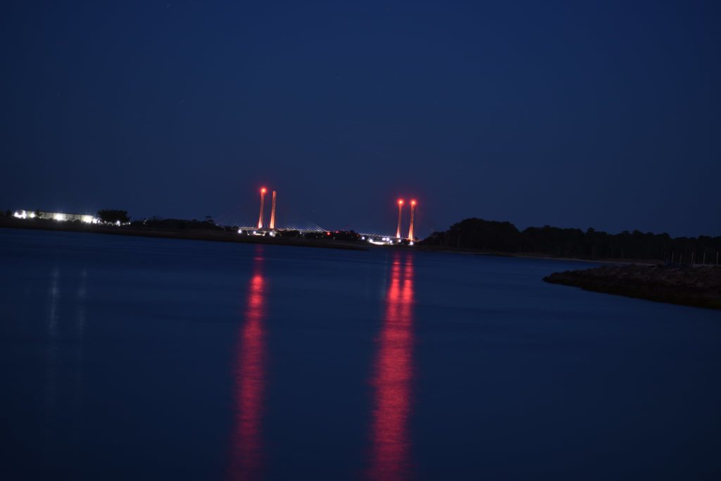 indian river inlet bridge is orange, red bridge,